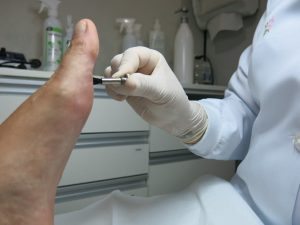 podiatrist treating toes