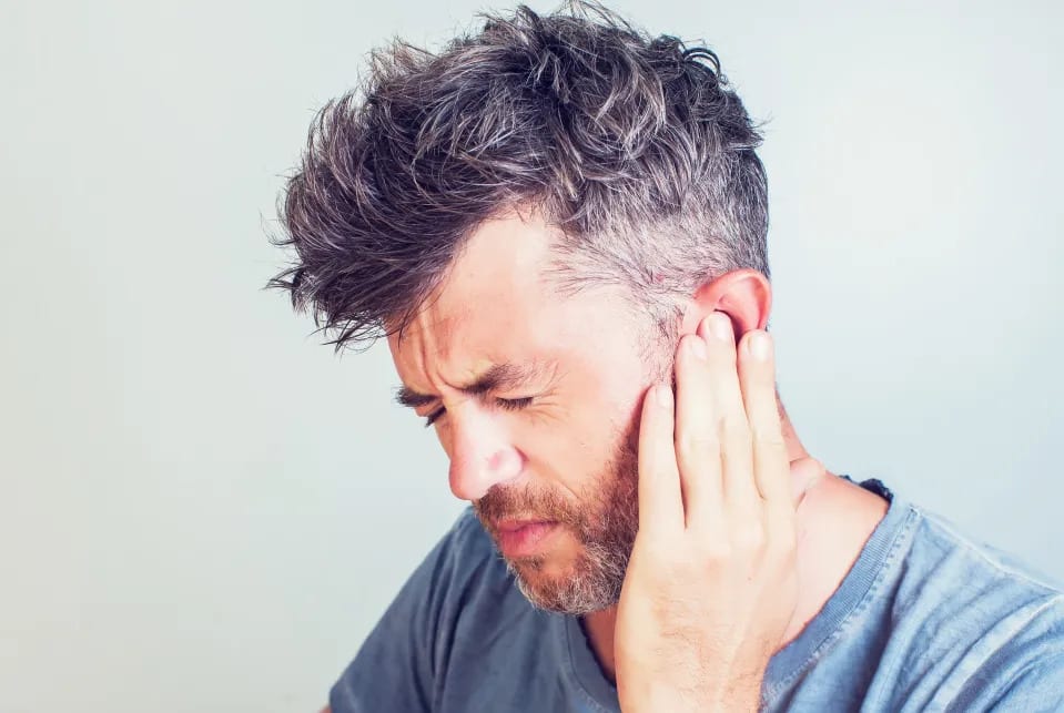 man with ear ache