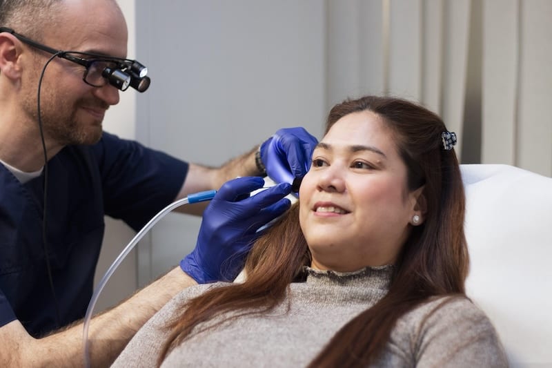 lady getting ear checked